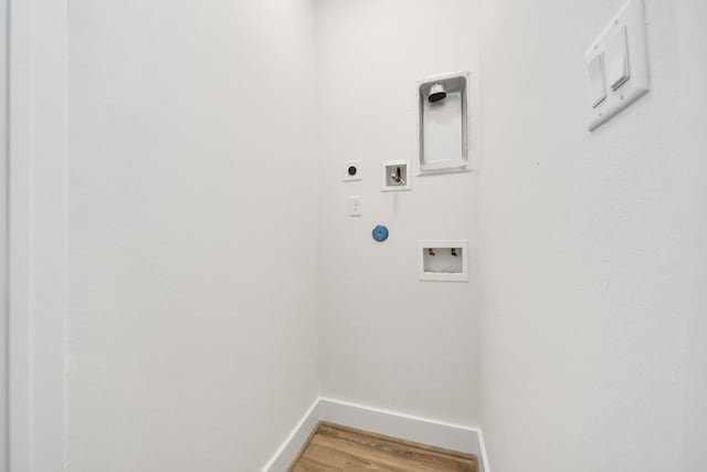 3453 Mainer St, Houston, TX 77021 - laundry room with electric dryer hookup, hookup for a washing machine, and light wood-style flooring