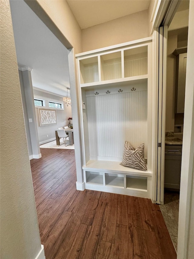 14912 Diamondhead Rd, Conroe, TX 77356 - mudroom with dark wood finished floors and a chandelier