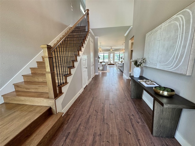 14912 Diamondhead Rd, Conroe, TX 77356 - foyer featuring stairs, dark wood-style flooring, and ceiling fan