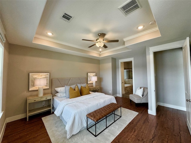 14912 Diamondhead Rd, Conroe, TX 77356 - bedroom featuring a tray ceiling, crown molding, dark wood-type flooring, recessed lighting, and a ceiling fan