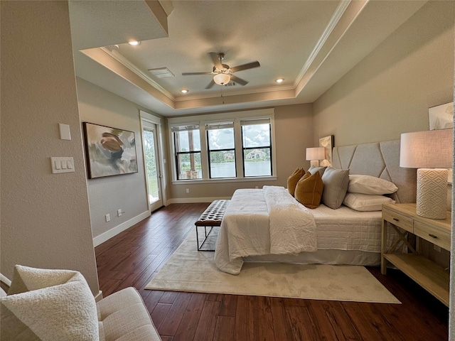 14912 Diamondhead Rd, Conroe, TX 77356 - bedroom with ornamental molding, a raised ceiling, access to exterior, hardwood / wood-style floors, and a ceiling fan