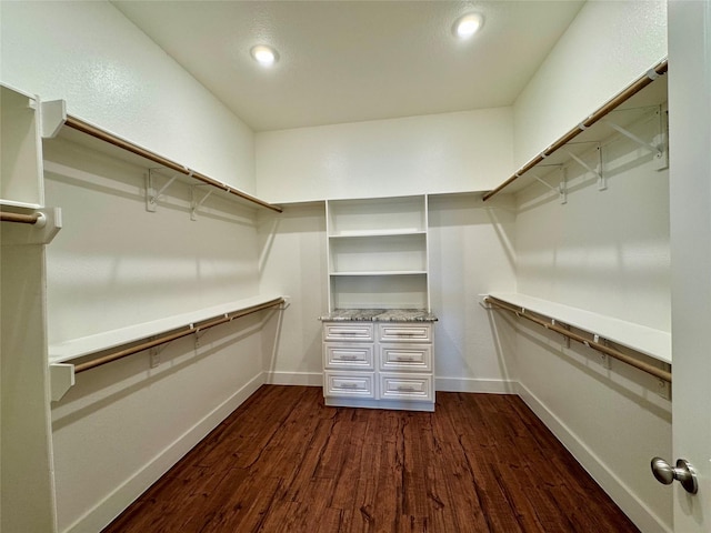 14912 Diamondhead Rd, Conroe, TX 77356 - spacious closet featuring dark wood-style flooring