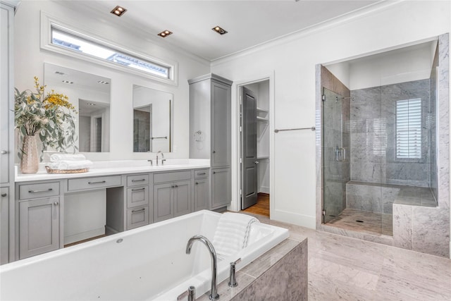 5219 Calle Cordoba Pl, Houston, TX 77007 - full bath featuring a bath, vanity, a shower stall, plenty of natural light, and ornamental molding