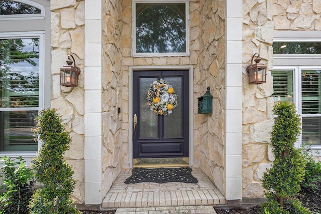 4925 Pine St, Bellaire, TX 77401 - entrance to property featuring stone siding