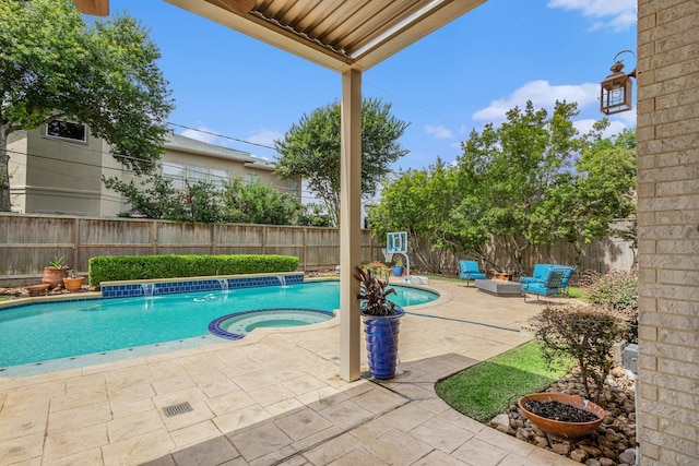 4925 Pine St, Bellaire, TX 77401 - view of swimming pool with a patio, a fenced backyard, and a pool with connected hot tub