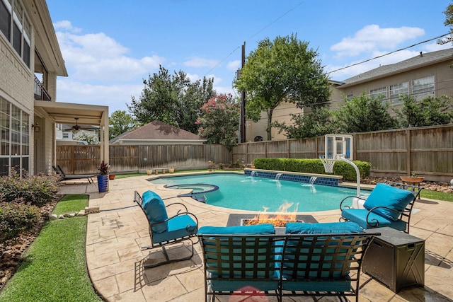 4925 Pine St, Bellaire, TX 77401 - view of swimming pool featuring a fenced backyard, a patio, a ceiling fan, and a pool with connected hot tub