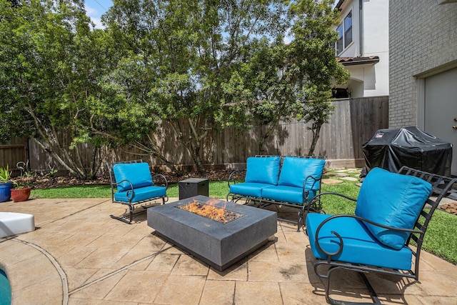 4925 Pine St, Bellaire, TX 77401 - fenced backyard featuring grilling area, a patio area, and an outdoor living space with a fire pit