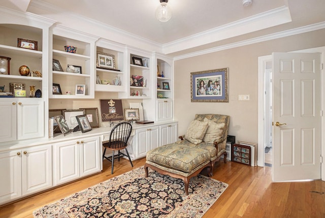 4925 Pine St, Bellaire, TX 77401 - sitting room with built in study area, light wood-type flooring, and ornamental molding