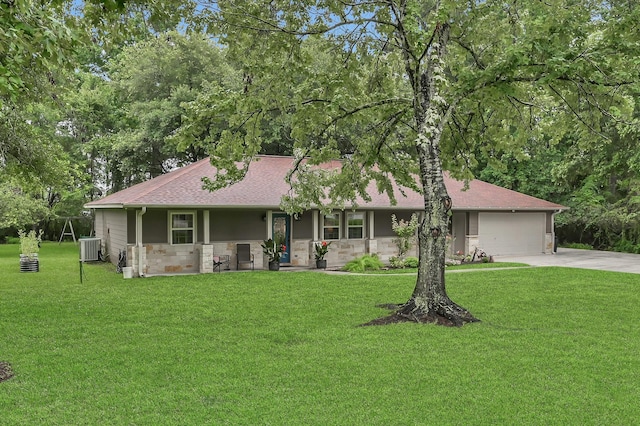 12626 Woodcreek Dr, Willis, TX 77318 - view of front facade featuring stone siding, concrete driveway, a front yard, a garage, and roof with shingles