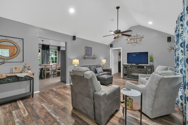 12626 Woodcreek Dr, Willis, TX 77318 - living room featuring dark wood-style flooring, a ceiling fan, recessed lighting, and high vaulted ceiling