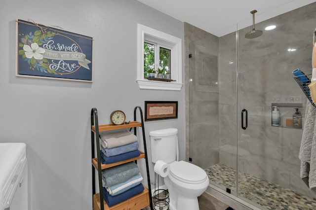 12626 Woodcreek Dr, Willis, TX 77318 - full bath with a stall shower and toilet