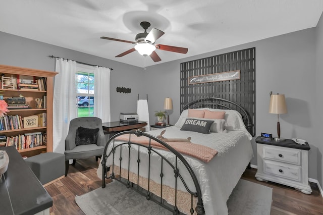 12626 Woodcreek Dr, Willis, TX 77318 - bedroom featuring wood finished floors and ceiling fan