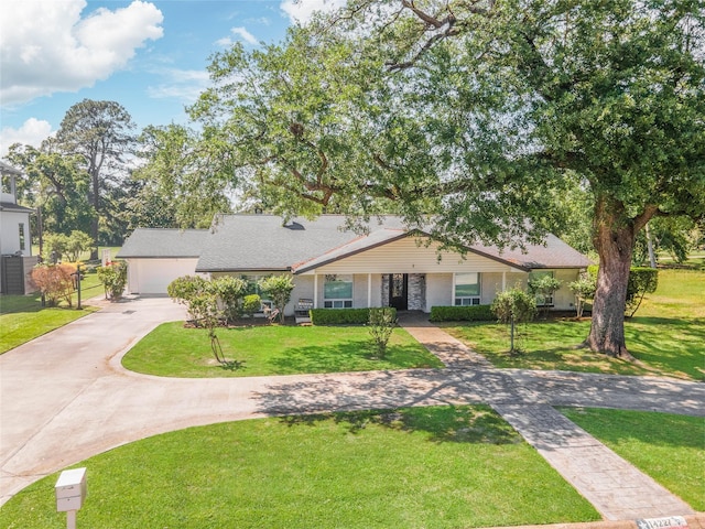 14227 Indian Wells Dr, Houston, TX 77069 - single story home with concrete driveway and a front lawn