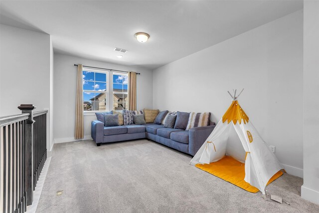 9219 Trimble Landing Dr, Tomball, TX 77375 - living room featuring carpet flooring and baseboards