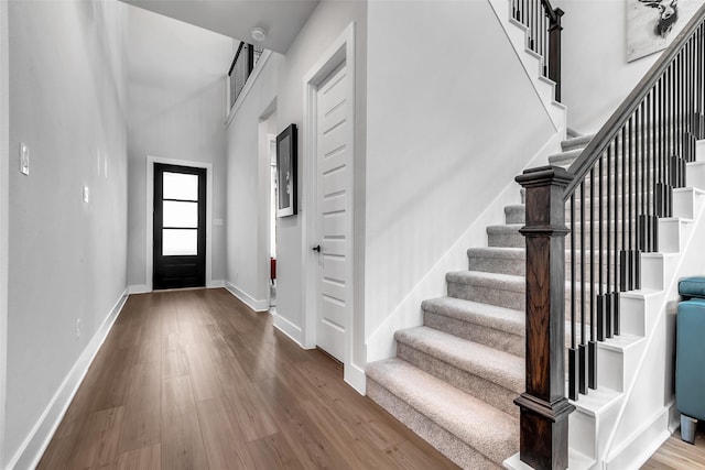 9219 Trimble Landing Dr, Tomball, TX 77375 - entryway featuring wood finished floors and stairs