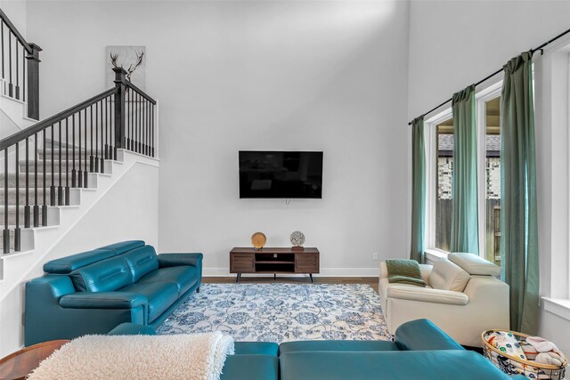 9219 Trimble Landing Dr, Tomball, TX 77375 - living area with stairway and wood finished floors