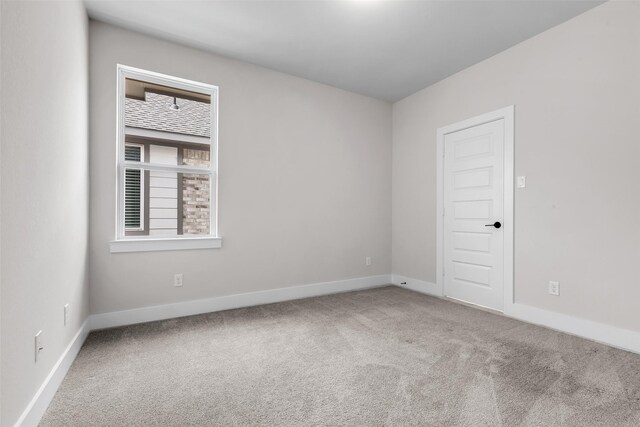 9219 Trimble Landing Dr, Tomball, TX 77375 - carpeted empty room featuring baseboards