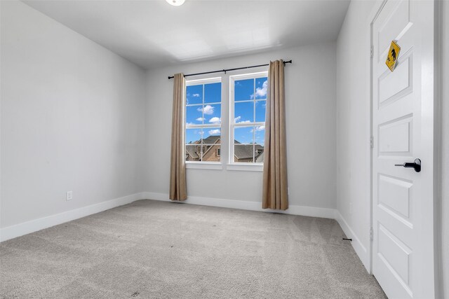 9219 Trimble Landing Dr, Tomball, TX 77375 - carpeted empty room with baseboards