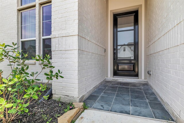 9219 Trimble Landing Dr, Tomball, TX 77375 - property entrance featuring brick siding