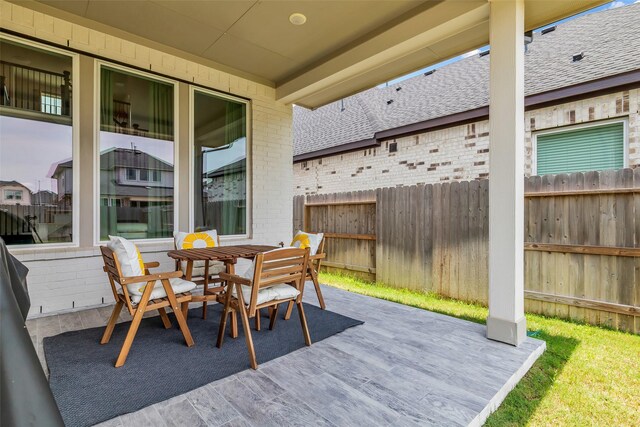 9219 Trimble Landing Dr, Tomball, TX 77375 - view of patio / terrace with outdoor dining area