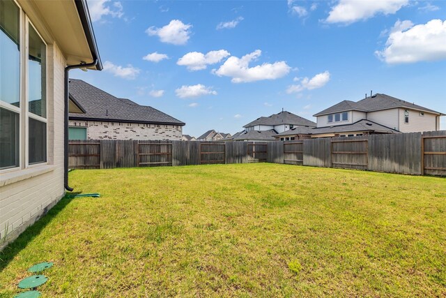 9219 Trimble Landing Dr, Tomball, TX 77375 - fenced backyard with a residential view