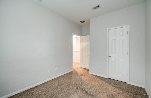 8718 Scott St Unit A B, Houston, TX 77051 - unfurnished bedroom featuring carpet floors and baseboards