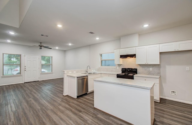8718 Scott St Unit A B, Houston, TX 77051 - kitchen featuring black range with electric cooktop, stainless steel dishwasher, dark wood-style flooring, white cabinets, and backsplash