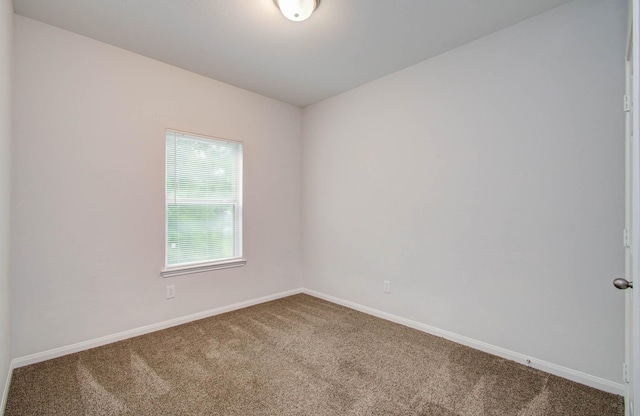 8718 Scott St Unit A B, Houston, TX 77051 - carpeted empty room with baseboards