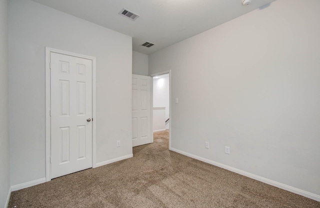 8718 Scott St Unit A B, Houston, TX 77051 - unfurnished bedroom with carpet and baseboards