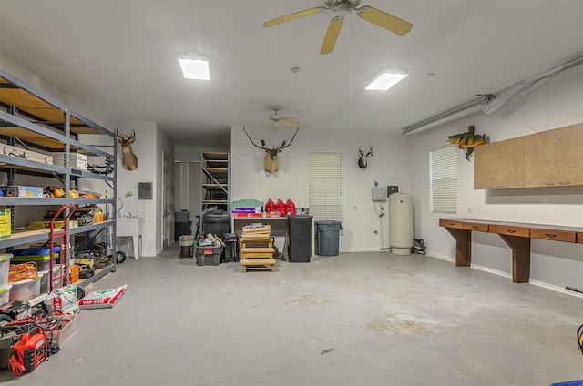 22222 Holly Creek Trl, Tomball, TX 77377 - garage with a workshop area and a ceiling fan
