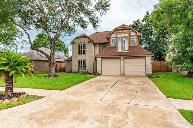 1417 S Heron Dr, Seabrook, TX 77586 - view of front of home featuring concrete driveway, an attached garage, roof with shingles, and brick siding