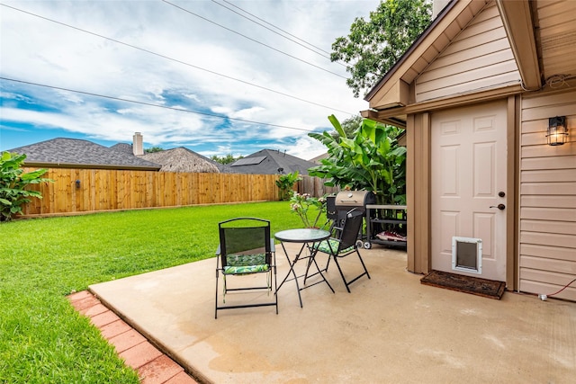 1417 S Heron Dr, Seabrook, TX 77586 - fenced backyard with a patio and area for grilling