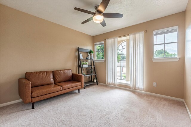 1417 S Heron Dr, Seabrook, TX 77586 - sitting room with a ceiling fan and carpet