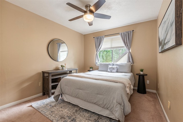 1417 S Heron Dr, Seabrook, TX 77586 - carpeted bedroom featuring baseboards and a ceiling fan