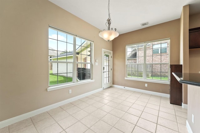 14210 Hansons Creek Ct, Houston, TX 77044 - unfurnished dining area featuring plenty of natural light and light tile patterned floors
