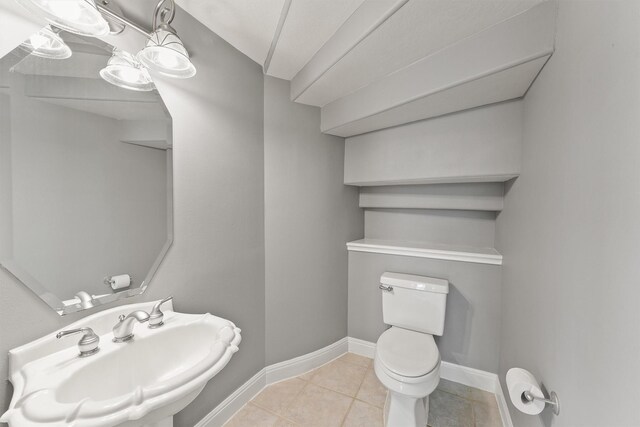 14210 Hansons Creek Ct, Houston, TX 77044 - bathroom with a sink and tile patterned floors