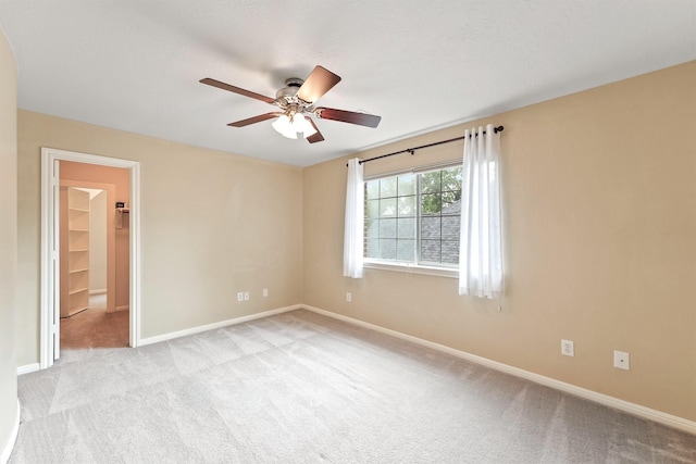 14210 Hansons Creek Ct, Houston, TX 77044 - spare room featuring light colored carpet and ceiling fan