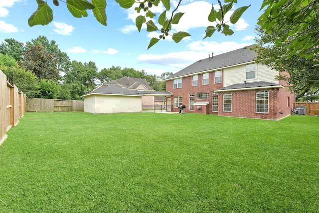14210 Hansons Creek Ct, Houston, TX 77044 - back of house featuring a fenced backyard and brick siding