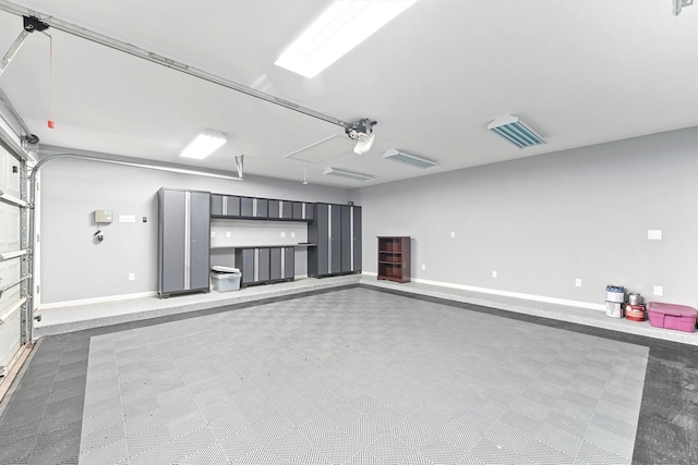 14210 Hansons Creek Ct, Houston, TX 77044 - garage featuring baseboards