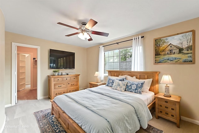 14210 Hansons Creek Ct, Houston, TX 77044 - bedroom with light carpet and a ceiling fan