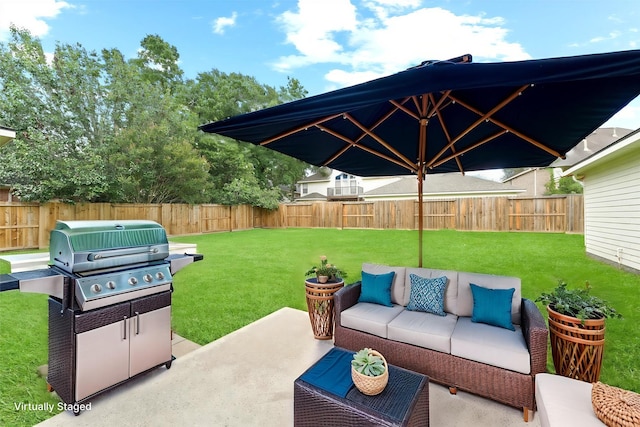 14210 Hansons Creek Ct, Houston, TX 77044 - fenced backyard featuring an outdoor hangout area, area for grilling, and a patio