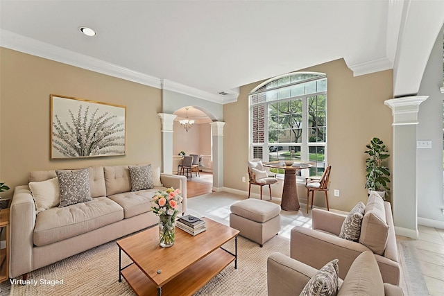 14210 Hansons Creek Ct, Houston, TX 77044 - living room with ornate columns, arched walkways, crown molding, and recessed lighting