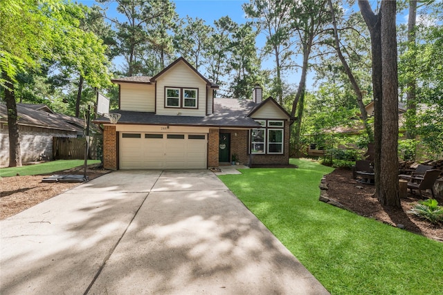 248 S Pathfinders Cir, The Woodlands, TX 77381 - view of front of home with brick siding, a garage, concrete driveway, and a chimney