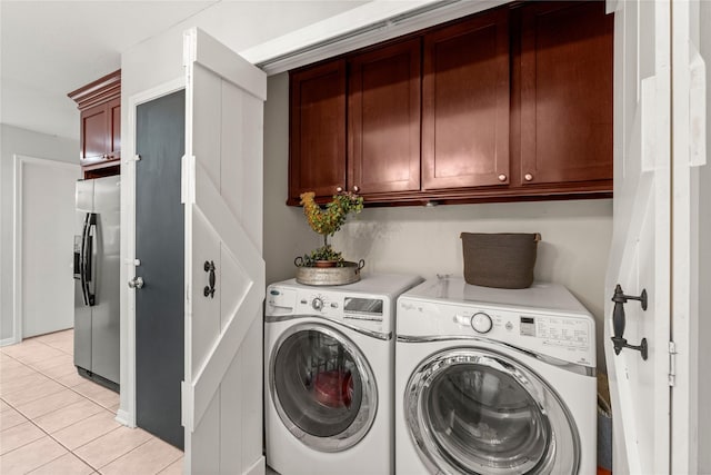 248 S Pathfinders Cir, The Woodlands, TX 77381 - laundry area with separate washer and dryer, cabinet space, and light tile patterned floors