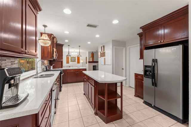 248 S Pathfinders Cir, The Woodlands, TX 77381 - kitchen featuring stainless steel appliances, open shelves, decorative backsplash, a kitchen island, and recessed lighting
