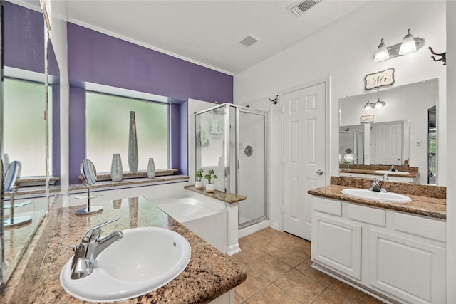 17706 Riata Lake Dr, Cypress, TX 77433 - full bathroom with a shower stall, two vanities, and a bath