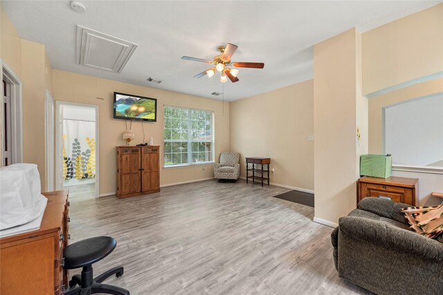 17706 Riata Lake Dr, Cypress, TX 77433 - home office with attic access, ceiling fan, and wood finished floors