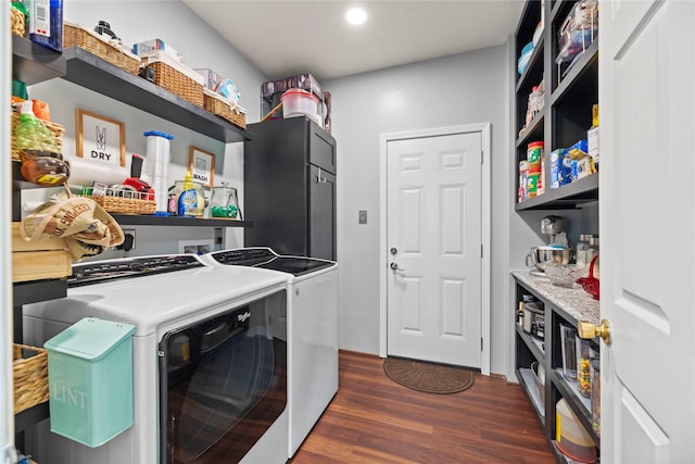 17706 Riata Lake Dr, Cypress, TX 77433 - laundry room with washer and clothes dryer, dark wood finished floors, recessed lighting, and bar