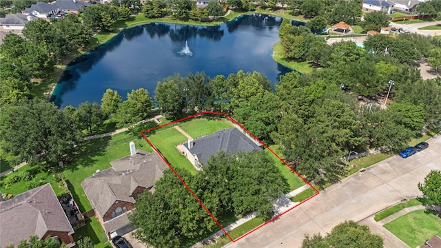 17706 Riata Lake Dr, Cypress, TX 77433 - aerial perspective of suburban area featuring property parcel outlined and a large body of water