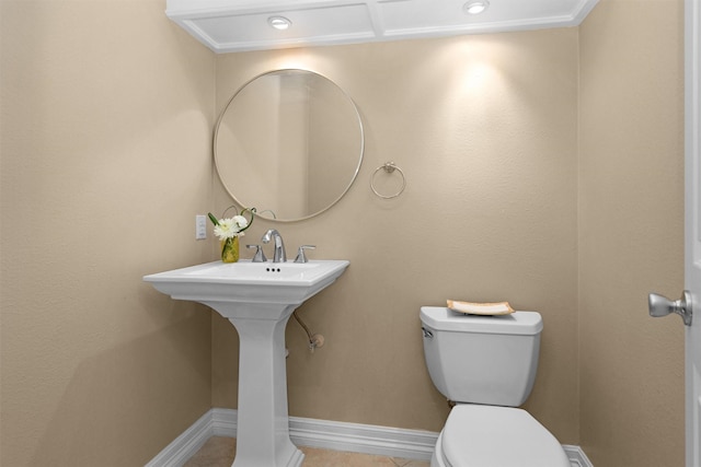 9311 Windrush Dr, Spring, TX 77379 - bathroom featuring toilet and tile patterned floors